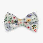 Floral and animal print bow tie on a white background