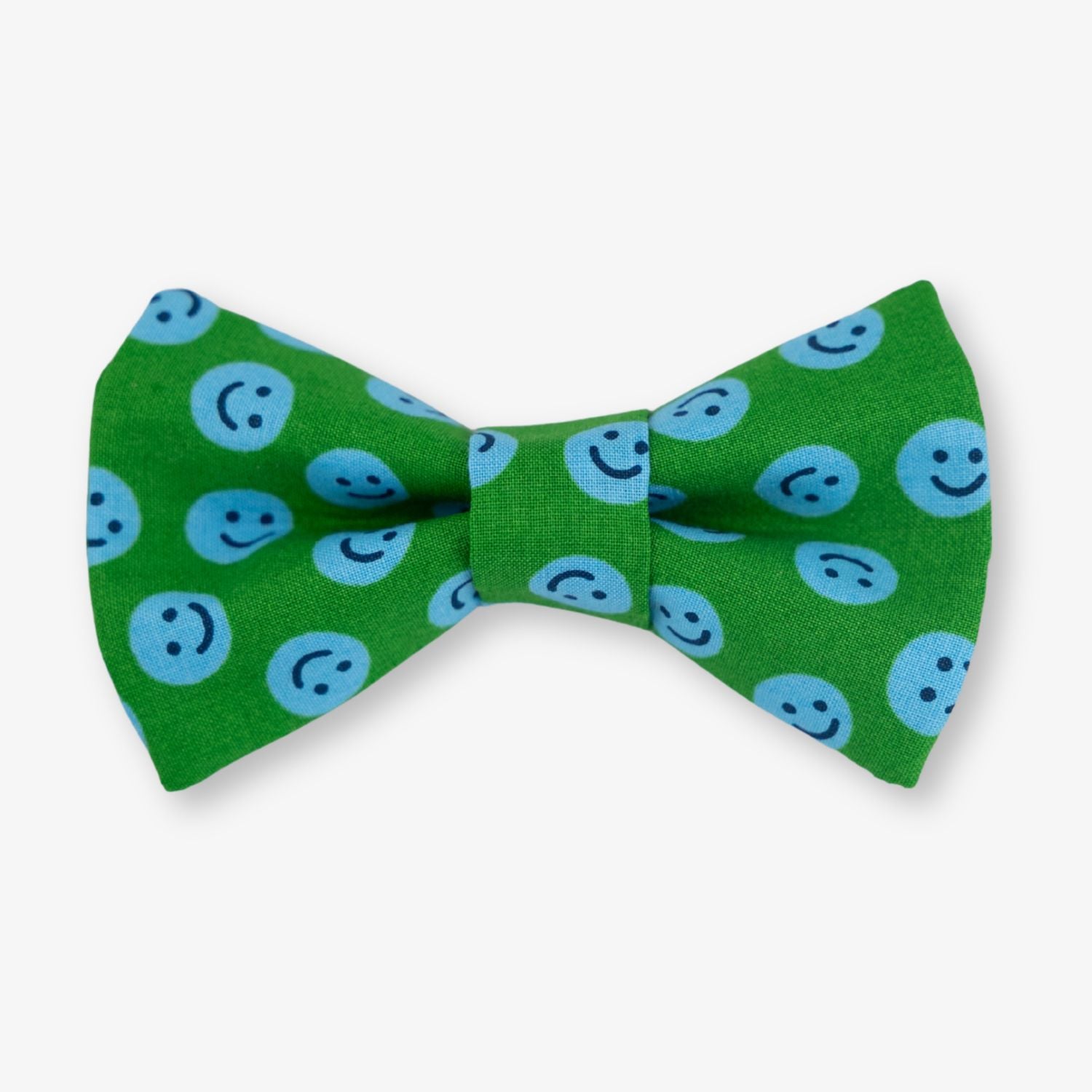 Green bow tie with blue smiley face pattern on a white background