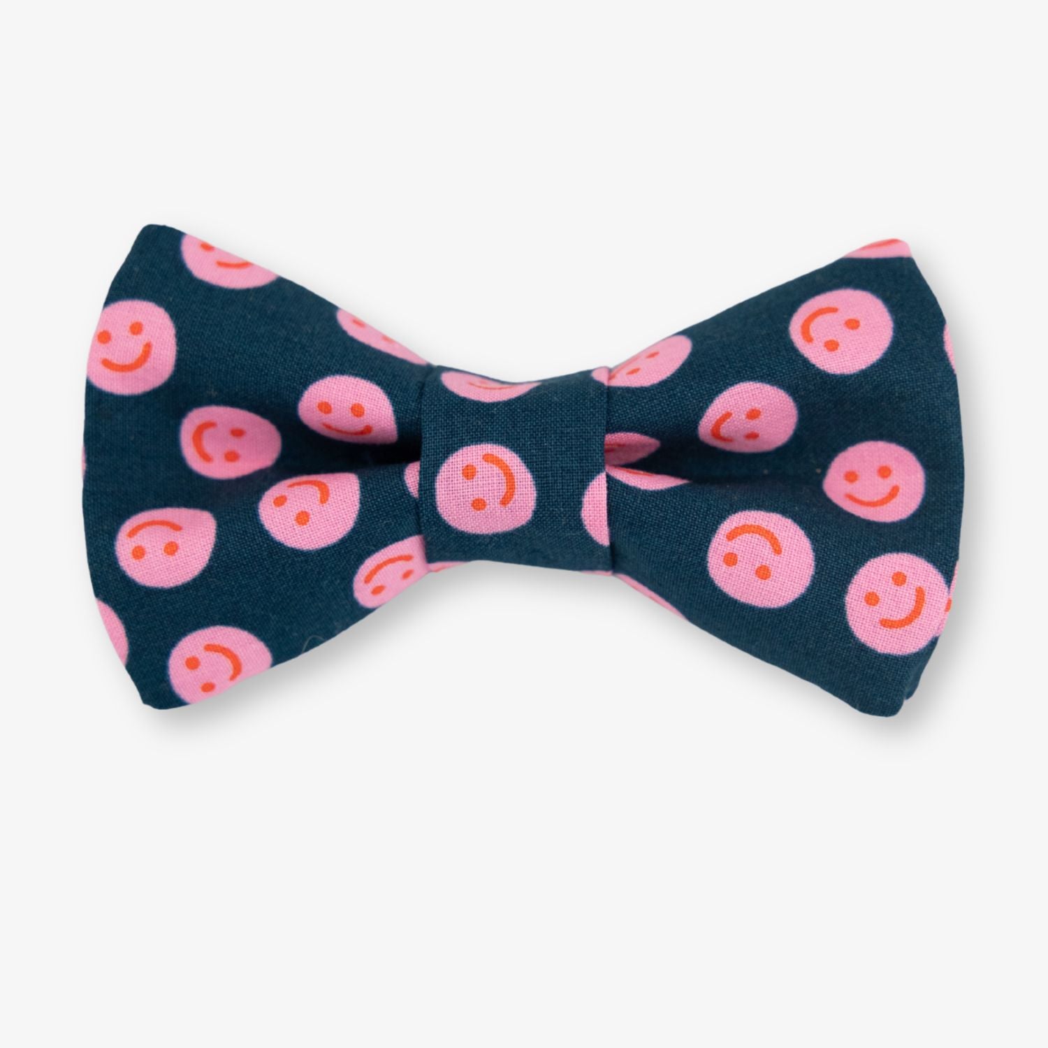 Navy blue bow tie with pink smiley face pattern on a white background
