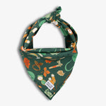 Green bandana with camp-themed print on a white background