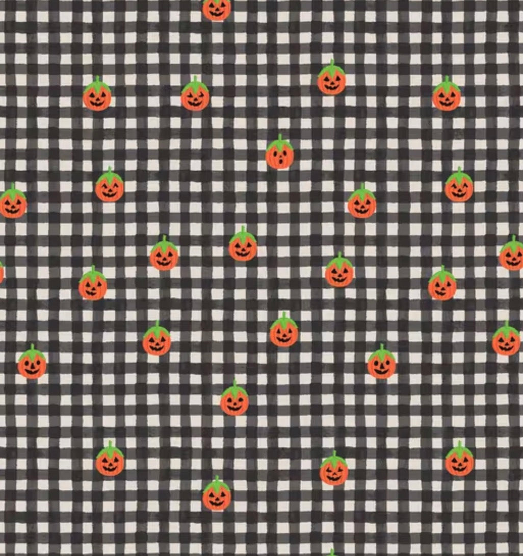A repeating Halloween pattern featuring small orange jack-o'-lantern pumpkins with green tops on a black and white gingham check background.